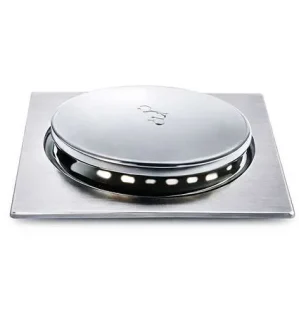 Stainless steel floor drain with pop-up for modern drainage systems.